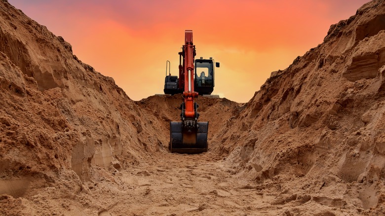 excavator in sand pit