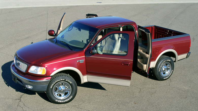 red 1999 Ford F-150 truck 