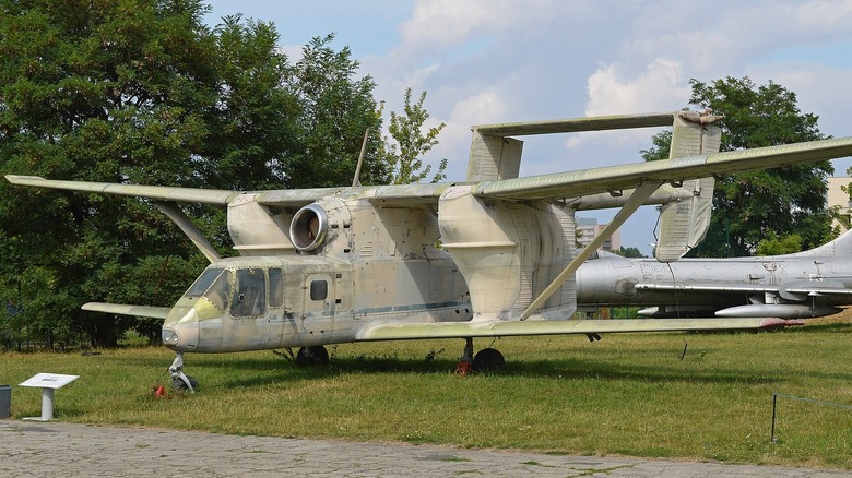 PZL M-15 biplane on an airstrip