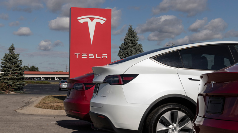 Three Teslas in a parking lot