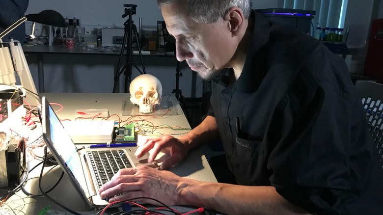 Andrew Adamatzky working on laptop