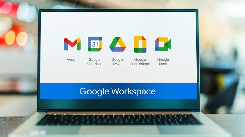 Laptop with Google Workspace logos