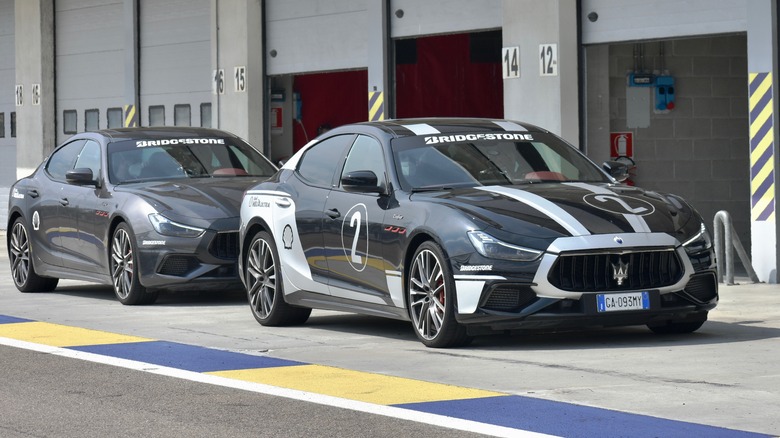 Maserati Ghibli Trofeos in the pit lane at Autodromo di Modena.