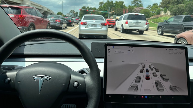 Tesla with Full Self-Driving engaged.