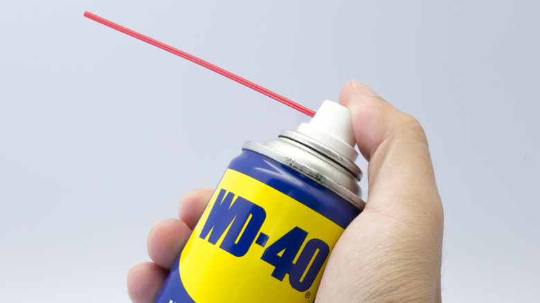 WD-40 can with straw