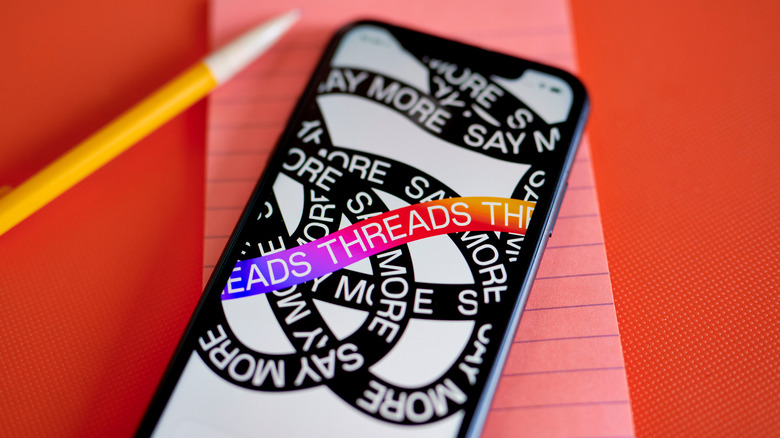 threads artsy logo phone