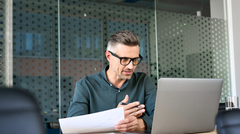 Man on computer speaking