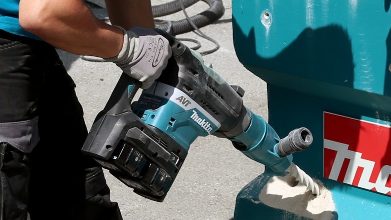 Person using heavy duty power tool