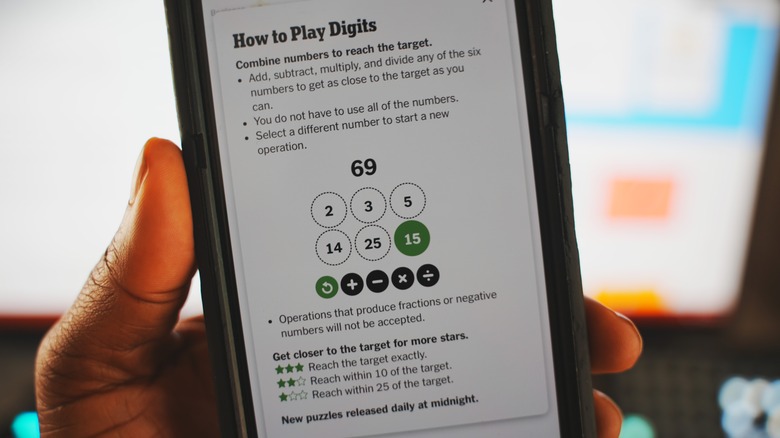 A photo of Digits game on phone