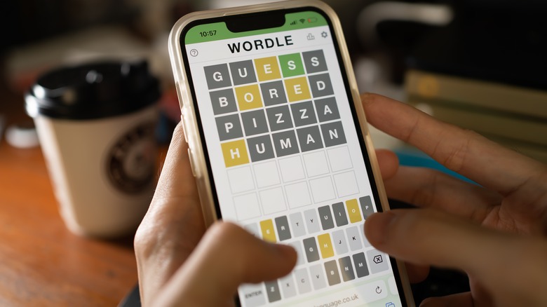 person playing Wordle on a smartphone