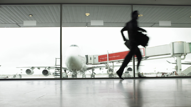 person hurrying airport