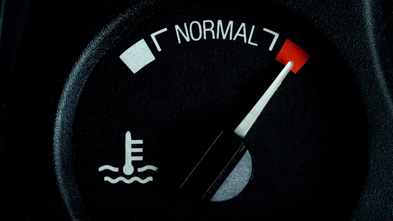 Engine temperature gauge showing the needle in the red zone