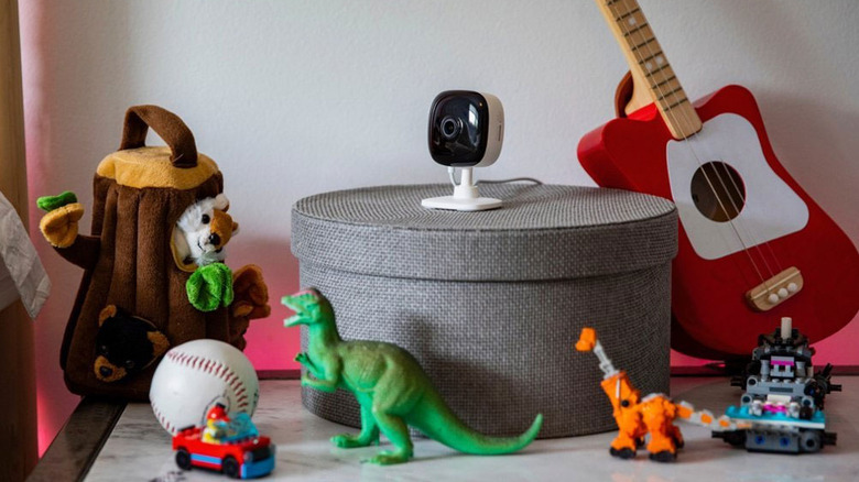 Kasa indoor camera around toys with guitar