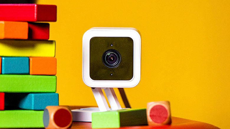 Wyze camera next to colorful building blocks