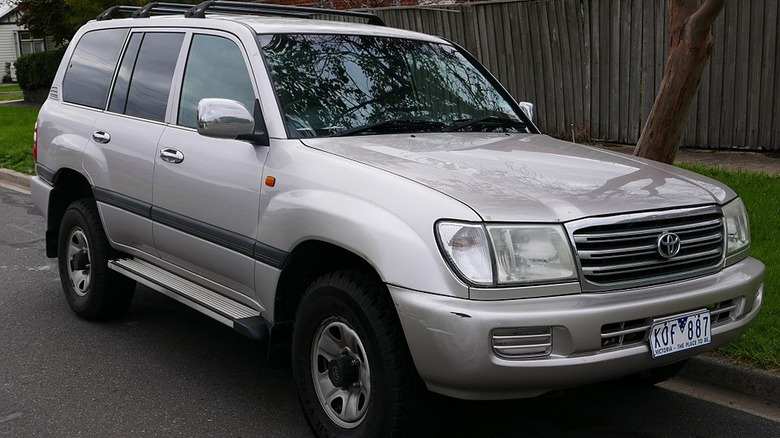 Silver 2004 Toyota Land Cruiser GXL parked on a curb