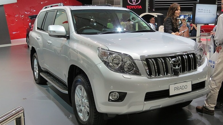 2012 White Toyota Land Cruiser Prado on display on a showroom floor