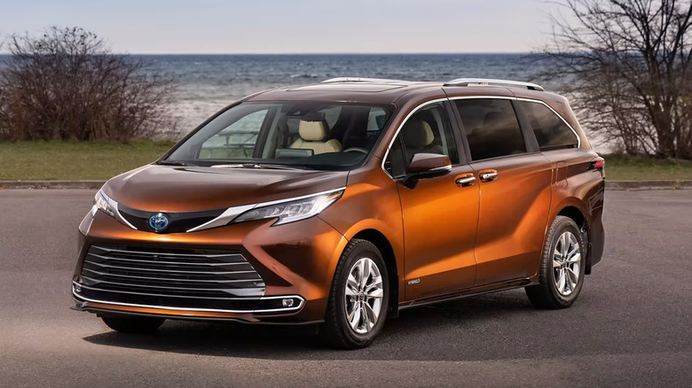 An orange 2021 Toyota Sienna hybrid