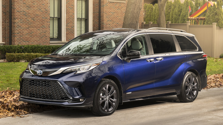 A blue 2022 Toyota Sienna parked on a street