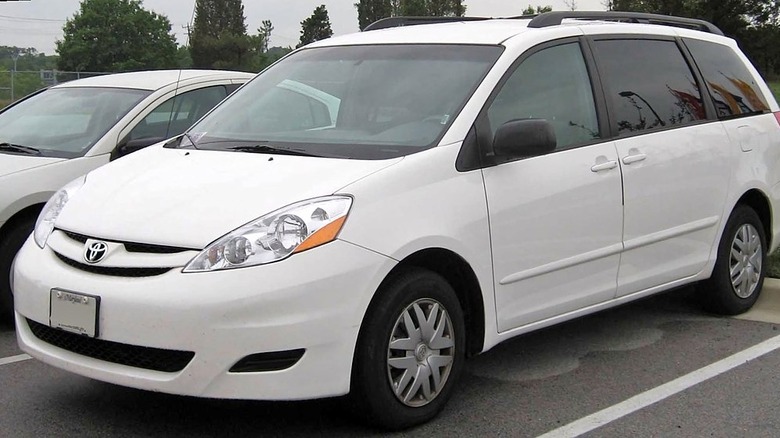 White 2008 Toyota Sienna in a parking lot