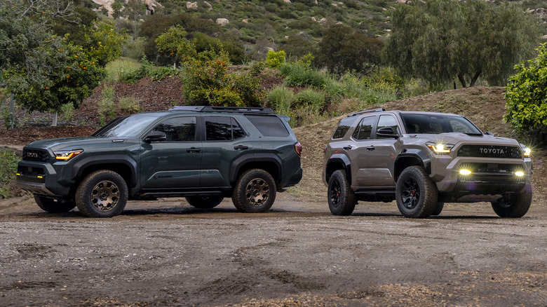 Two 2025 Toyota 4Runners parked dirt