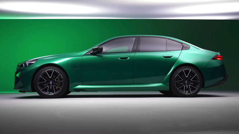 A side-view of the 2025 BMW M5 in green