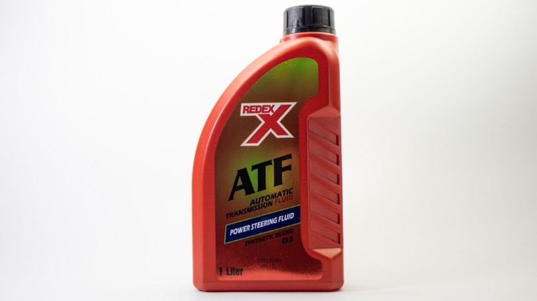 A bottle of Redex ATF (automatic transmission fluid) also used as power steering fluid