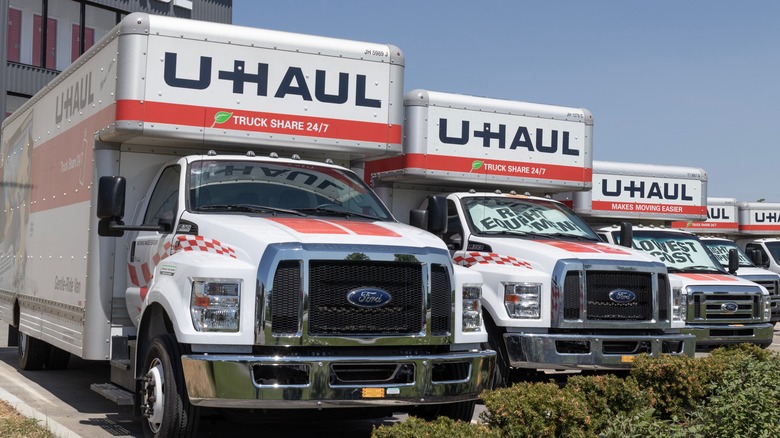 Line of parked U-Haul trucks