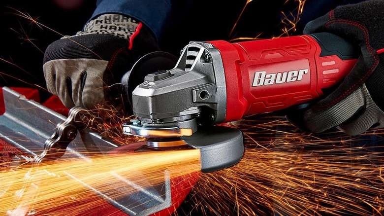 A person using a Bauer angle grinder