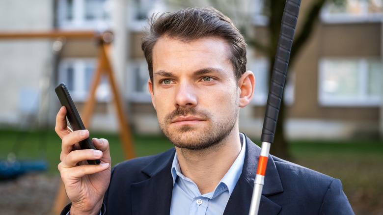 blind man using smartphone