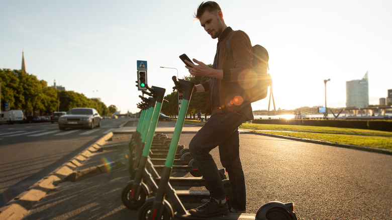 Man on e-scooter