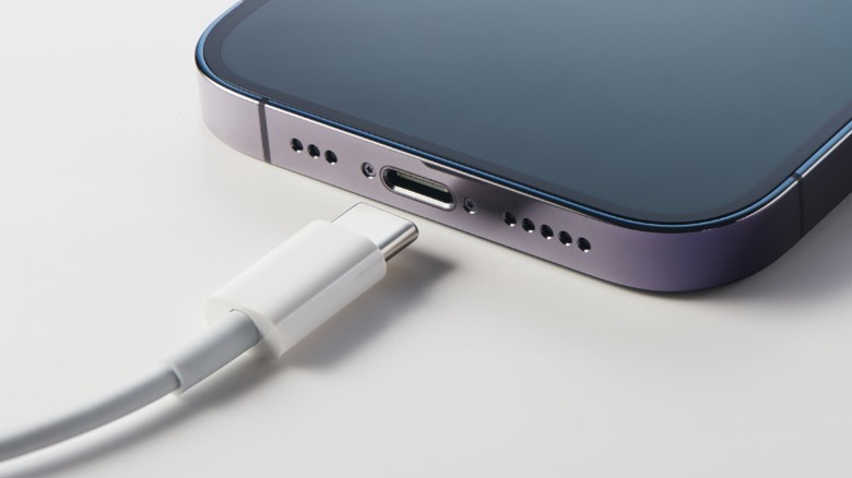 USB-C cable being plugged into an iPhone