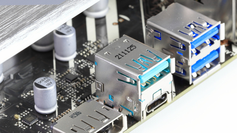 Different types of USB ports on a computer board