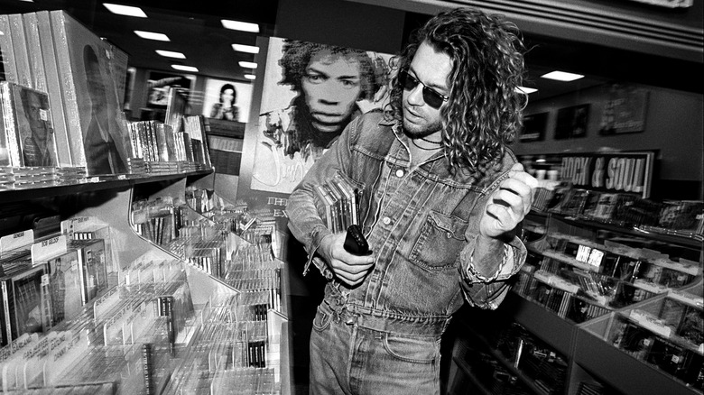 INXS lead singer Michael Hutchence goes CD shopping in October 1993