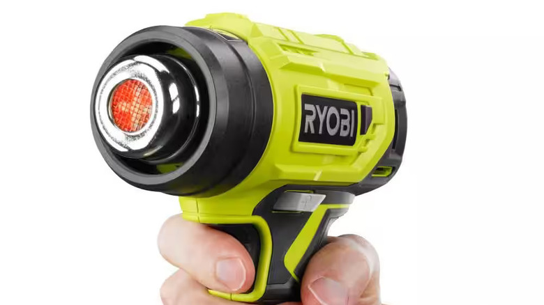 A Ryobi heat gun powered on.