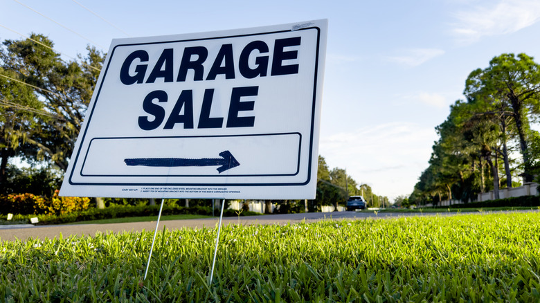 garage sale sign in neighborhood