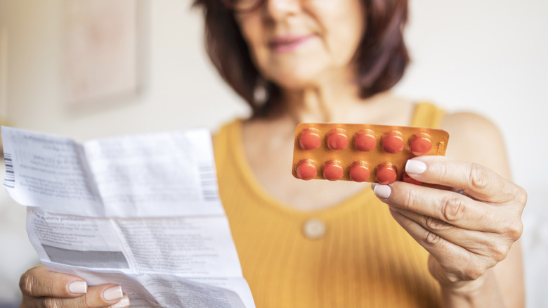 Woman checking her prescription