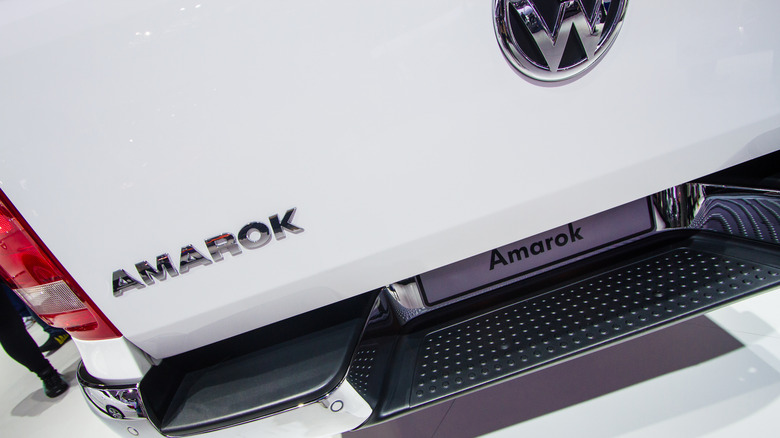 The back of a Volkswagen Amarok with the Amarok nameplate and part of the VW logo