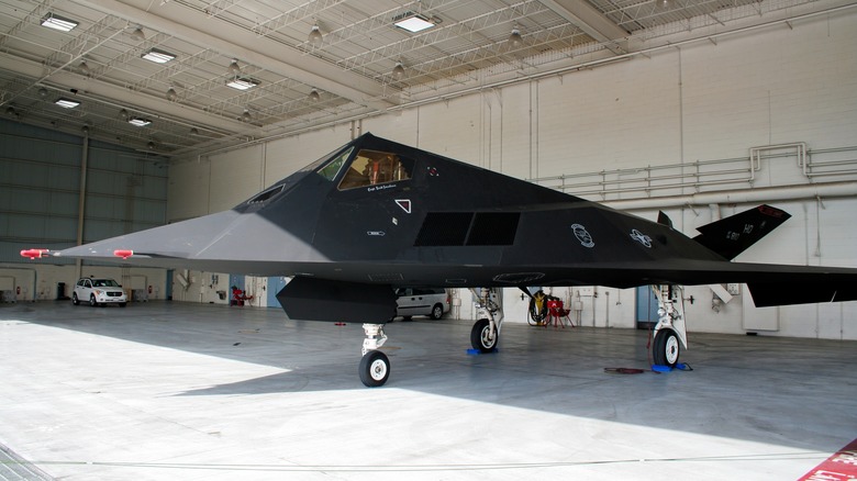 A B-2 Spirit bomber parked in a hangar