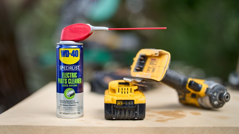 WD-40 on workbench with tools