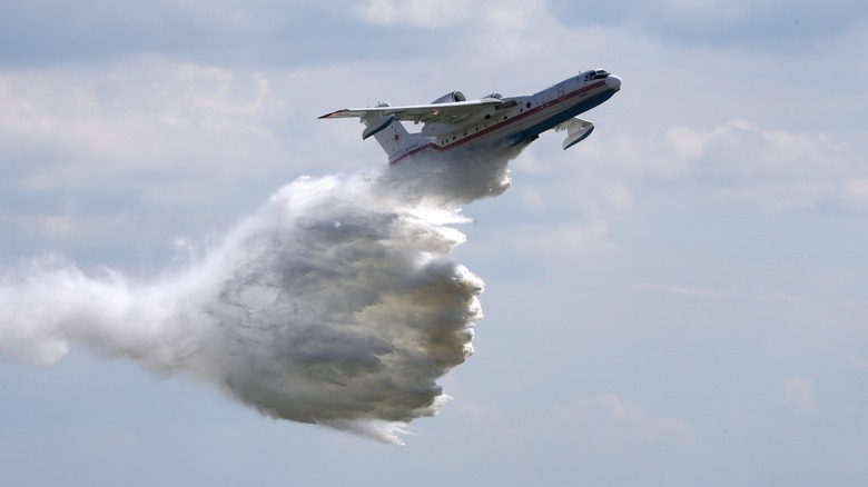 A Russian Beriev BE-200 releasing water.