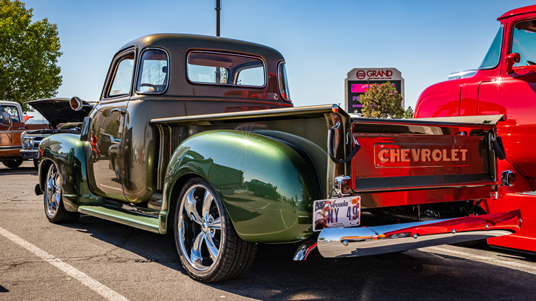 rear quarter view of a custom painted 1948 Chevrolet 3100 5 window truck