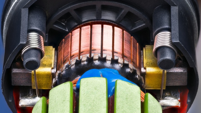 Close up of brushed motor showing brushes against commutator.