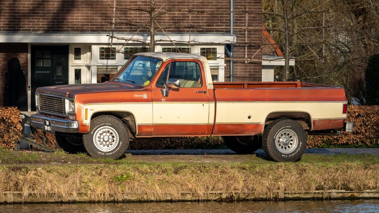 Chevy square-body pickup parked