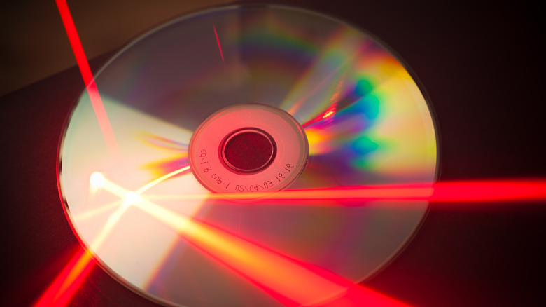 DVD with red laser shining