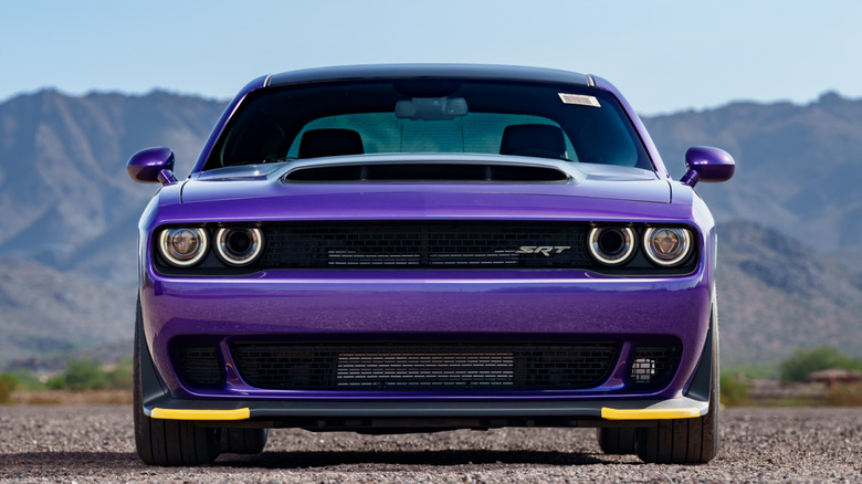 Dodge Challenger Demon 170 parked showing yellow splitter guards on the front of the car