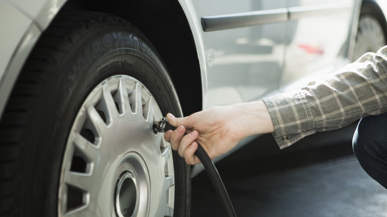 Hand inflating a tire