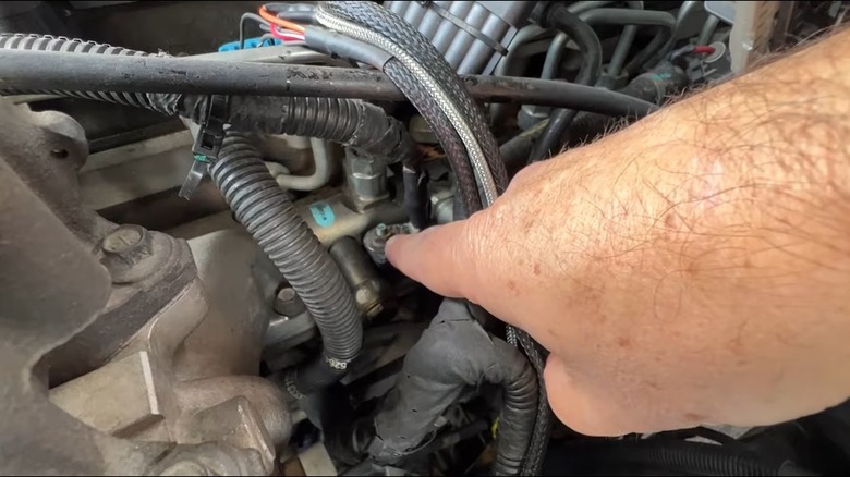 The Location Of The Grid Heater Bolt On 6.7L Cummins