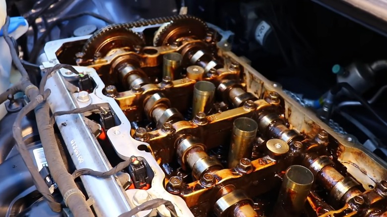 cylinder head with engine sludge