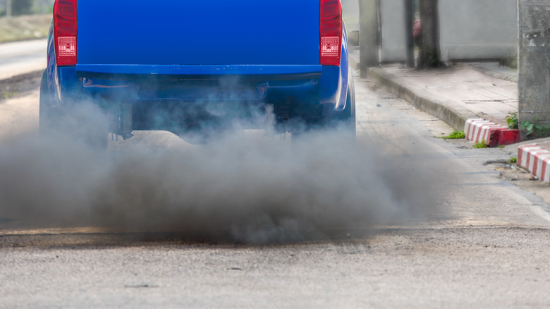 Diesel truck spewing thick smoke