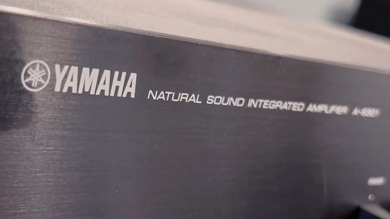 The front of a Yamaha A-S301 amplifier.